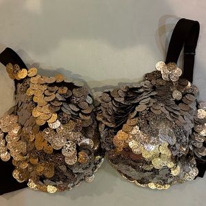 Black coin bra with hand-sewn silver colored coins.